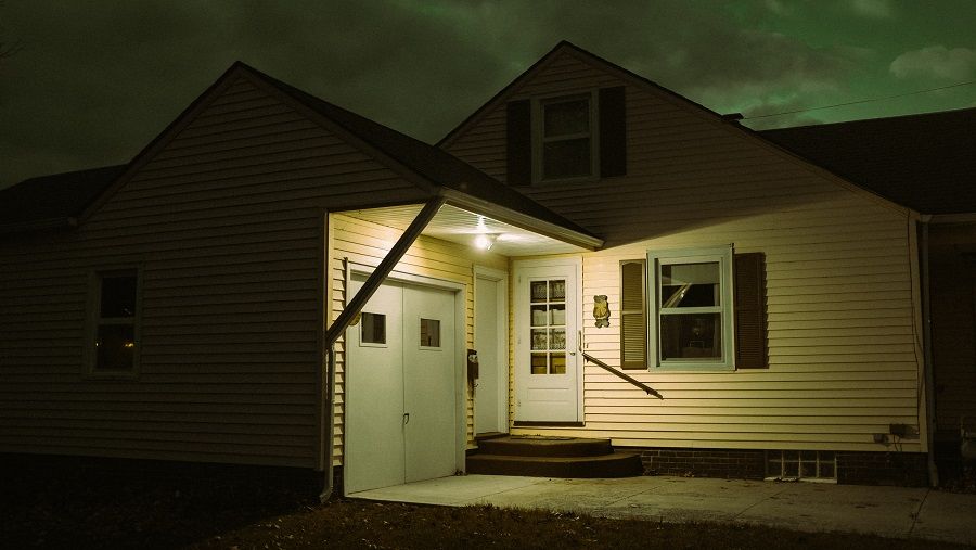 Motion-activated yard lights scare away unwanted visitors at night.